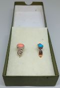A 9ct gold ring set with turquoise, 1.7g, together with a silver ring set with coral. (2)