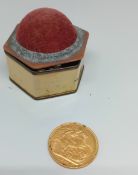 A Victoria 1891 full Gold Sovereign, in a hexagonal box.