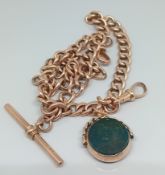 A 9ct gold 'curb' style double Albert chain with 'T' bar, with swivel stone set fob, possible
