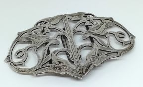 A silver nurses buckle, of engraved foliate design, hallmarked Birmingham 1901, maker William