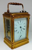 A french gilt repeat carriage clock, marked Le Roy & Fils, Paris, with two keys.