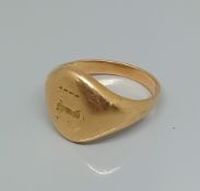 A 9ct gold signet ring, weight 8.4g.