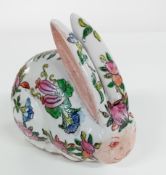 A 20th century Chinese porcelain rabbit, hand painted in famille rose palette, height 11cm. Sold