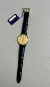 Eterna, a gents 18ct gold date wristwatch with gold baton dial.