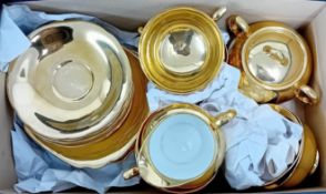 A Windsor china gold tea set, to include 6 teacups, 6 saucers, 6 sideplates, and a sugar bowl.