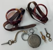 An intricate silver ladies pocket fob watch, with elaborate engraved foliate decoration, roman
