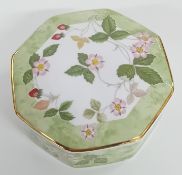 A Wedgewood lidded jewellery dish, in printed wild strawberry pattern on a dappled green ground,