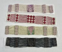 A set of four beaded chokers, boxed possibly from Adolf Abraham, Frankfurt?