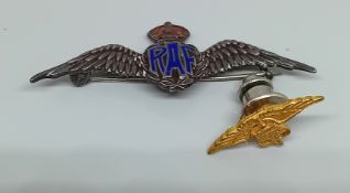 Two RAF brooches, to include a silver and enamel brooch and a gilt pin. (2)
