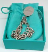 A Tiffany & Co. silver link bracelet with tag, weight 37.4g.