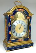 A modern bracket clock by Knight & Gibbins of London in a blue lacquered decorated case, with key,