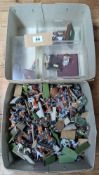A collection of painted and part-painted figures of Napoleonic guards, soldiers, calvary and