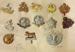 A collection of 20th century cap badges, to include a Royal Berkshire Regiment, Former Berkshire