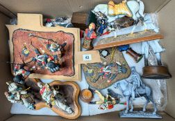 A collection of painted and part-painted figures of Napoleonic guards, soldiers, calvary and
