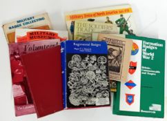A collection of 20th century books on military cap badges and other military subjects, together with