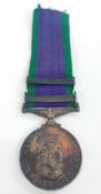 An Elizabeth II Campaign Service medal, with Malay Peninsula and Radfan clasp, inscribed '073424 M.