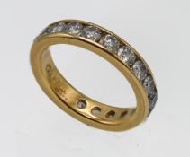 An 18ct yellow gold and diamond full eternity ring, size H/I.