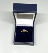 An 18ct diamond solitaire ring, old cut stone, 8 claw setting, set in yellow gold size N.