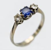 An 18ct white gold diamond and tanzanite, ring, size M/N.
