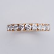 An 18ct yellow gold half eternity style ring set with approx. 0.90 carats of round brilliant cut