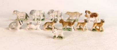 A collection of first edition Wade Whimsies to include Badger, dogs, etc. (12)