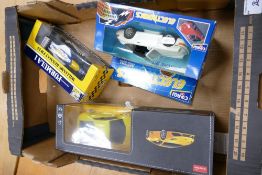A collection of Boxed Model Toy Cars including Rastar Lamborghini Huracan Lp 610-4, Corgi Electronic