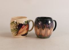 Two Moorcroft mugs to include Vegatable patch and Cluny(2)