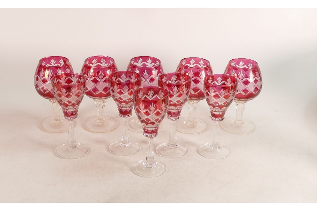 A set of 10 Cranberry red glasses to include five Cognac glasses together with five Port glasses. (