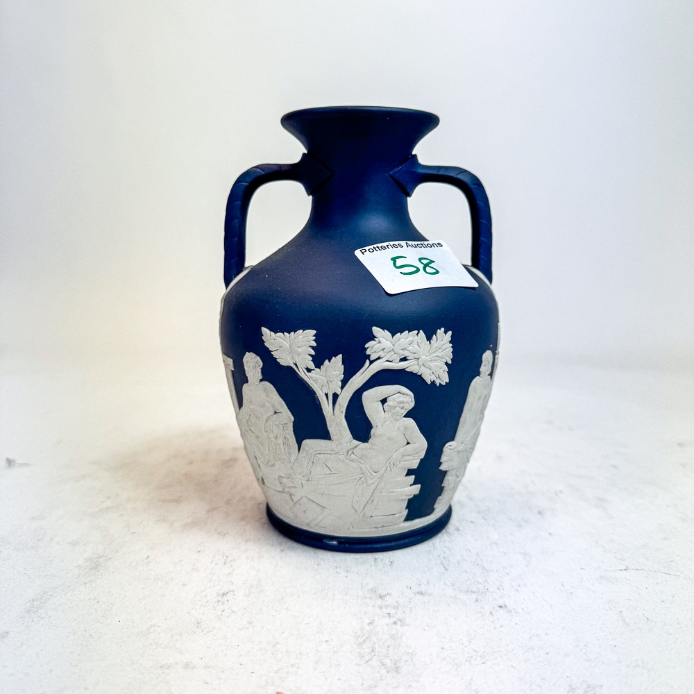 Wedgwood Dark Blue Jasperware Portland vase, 15.5cm.