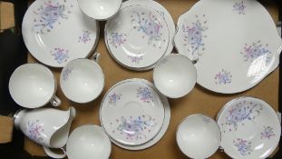 Royal Albert Ribbons and Bows 21 piece tea set to include 6 trio's, milk jug, sugar bowl, cake plate