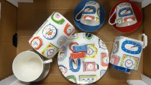 A collection of Cath Kidston kitchen ware to include large cup & saucer, plate, metal storage