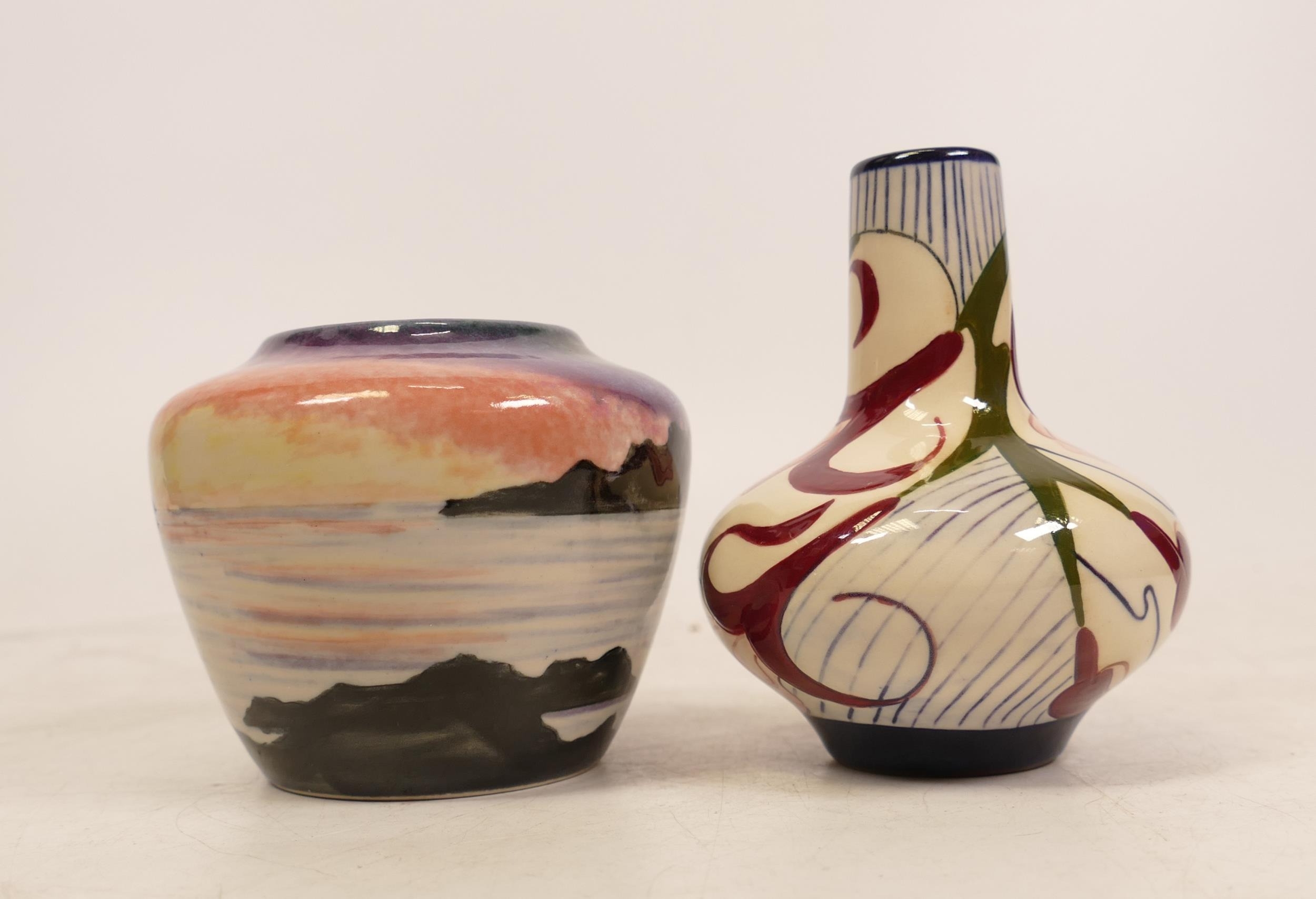 Cobridge stoneware vase decorated with lake scene at sunset together with Black Ryden floral vase.