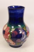 Large Moorcroft Anemone vase on blue ground. Height 26cm