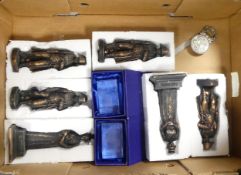 A collection of bronzed boxed figures of napoleon and Queen Elizabeth together with 2 boxed Napoleon