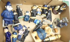 A large collection of novelty resin and ceramic figures of police theme (1 tray)