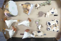 A mixed collection of items to include ducks, novelty pigs, birds and hedgehogs (1 tray)