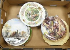 A collection of decorative wall plates to include Crown Devon cries of London, Danbury Mint