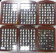 A collection of thimbles to include advertising, commemorative, ship themes, train themes, bank