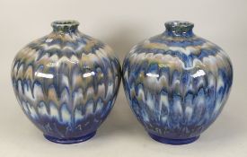 A pair of Cobridge stoneware Peacock feather patterned vases. Height 23cm