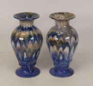 A pair of Cobridge stoneware Peacock feather patterned vases. Height 15cm (2)