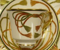 A collection of De Lamerie Fine Bone China heavily gilded Rope & Tassel patterned items to include