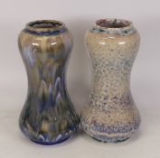 Two Cobridge stoneware Peacock feather and mottled patterned vases. Height 20cm