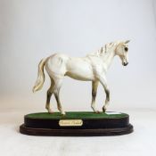 Royal Doulton prestige model of Dessert Orchid on plinth, h. 23cm.