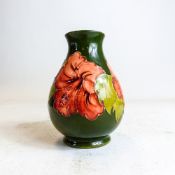 Moorcroft vase decorated in the Hibiscus design, C1980s, h.14cm.