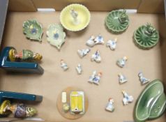 A pair of Leprechaun bookends, a collection of various Lucky Fair Folk figures, Shamrock pin dishes,