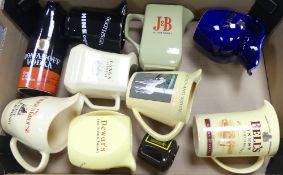 A collection of Wade water jugs to include Famous Grouse, White Horse, Dewars, Tia Maria, etc (1