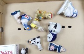 A collection of Wade figures to include Panda, Pantomime dame, Pantomime Horse, The Official