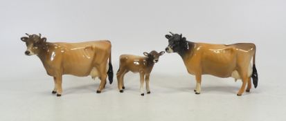 Beswick Guernsey Cattle including Two Cows and a Calf (3)