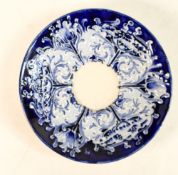 Moorcroft Florian Orphaned saucer in the Poppy pattern. Diameter: 11.6cm