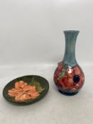 Moorcroft, Anemone on Blue Ground Vase together with a small Hibiscus on Green Ground pin dish (2)